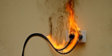 bigstock-On-Fire-Electric-Wire-Plug-Rec-388489015.jpg
